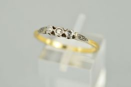 A THREE STONE DIAMOND RING designed as three single cut diamonds within a rub over settings to the