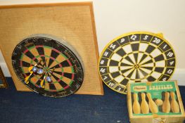 A DARTS BOARD with darts, another darts board and boxed skittles game (3)