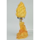 AN ART DECO WALTHER & SOHNE STYLE AMBER GLASS TABLE LAMP, seated lady supporting central column with