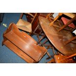 AN OAK BARLEY TWIST DROP LEAF DINING TABLE, two similar chairs, two other chairs, an oak two door