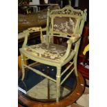 A PAINTED EDWARDIAN FRENCH ELBOW CHAIR together with a Victorian ebonised and mother of pearl