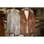 TWO CONEY FUR JACKETS, the first in brown is size 16, the second in grey is sized as 42