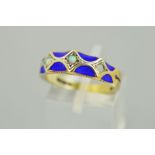 A 9CT GOLD ENAMEL AND OPAL RING, designed as scalloped blue guilloche enamel panels centrally set