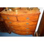 A GEORGIAN MAHOGANY BOWFRONT CHEST of two short and three long drawers on splayed bracket feet,