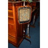 A GEORGIAN MAHOGANY POLESCREEN with needlework detail (sd)