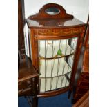AN EDWARDIAN MAHOGANY AND INLAID LEAD GLAZED BOWFRONT SINGLE DOOR CHINA CABINET, width 59cm x