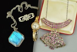 A NECKLACE, WATCH, PENDANT AND A BROOCH, the necklace designed as a triangular panel of a floral and