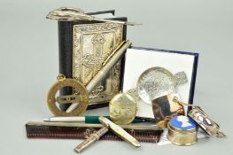 A SELECTION OF NOVELTIES to include a leather cased bible with embossed silver front panel, a