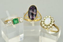 THREE GEMSTONE SET RINGS to include a 9ct gold Blue John oval cabochon, rub over set, ring size N,