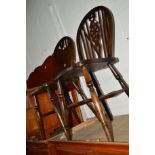 FOUR VARIOUS OAK WHEEL BACK CHAIRS including two carvers, together with a pair of early 20th Century