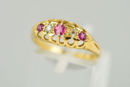 AN EARLY 20TH CENTURY 18CT GOLD RUBY AND DIAMOND RING designed as three graduated circular rubies