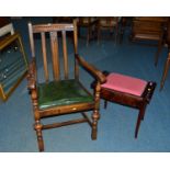 AN EDWARDIAN MAHOGANY PIANO STOOL and an oak chair (2)