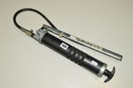 AN ARMY ISSUE GREASE GUN, all complete