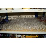 A LARGE COLLECTION OF CUT GLASS, to include decanters, jugs, claret jug, bowls, glasses etc, some
