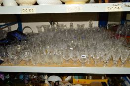 A LARGE COLLECTION OF CUT GLASS, to include decanters, jugs, claret jug, bowls, glasses etc, some