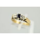 A 9CT GOLD SAPPHIRE AND DIAMOND THREE STONE RING, ring size J, hallmarked 9ct gold, approximate