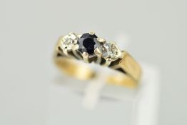 A 9CT GOLD SAPPHIRE AND DIAMOND THREE STONE RING, ring size J, hallmarked 9ct gold, approximate