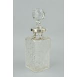 A SILVER COLLARED CUT GLASS DECANTER AND STOPPER, Birmingham marks, with patented lock (no key),