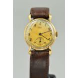 A GENTLEMAN'S DENCO WRISTWATCH, the circular face with Arabic numerals and brown leather strap,