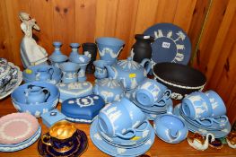 A LARGE GROUP OF WEDGWOOD JASPERWARES, mostly light blue teawares and trinkets, a black bowl and two