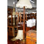 AN EDWARDIAN MAHOGANY STANDARD LAMP with a shade, together with a brass standard lamp with shade (