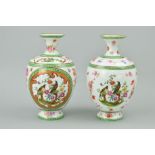 A PAIR OF PORCELAIN VASES, printed birds and foliage detail, height 22.5cm (2)
