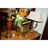 A MODERN BRASSED AND MAHOGANY TABLE LAMP, a brassed twin table lamp and a log bucket (3)