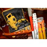 A COLLECTION OF SURVEYING AND SAFETY EQUIPMENT, to include a boxed topcon gts-212, spare battery,