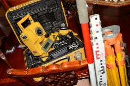 A COLLECTION OF SURVEYING AND SAFETY EQUIPMENT, to include a boxed topcon gts-212, spare battery,