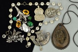 A SELECTION OF JEWELLERY, to include a colourless paste necklace, one paste missing, an Egyptian