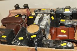 A TRAY OF CAMERAS AND BINOCULARS, including a Rollei B35, Taron, Praktica, Zenith, etc