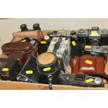 A TRAY OF CAMERAS AND BINOCULARS, including a Rollei B35, Taron, Praktica, Zenith, etc