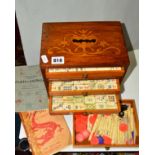 A MAH-JONG SET, bone and bamboo, housed in a table top five drawer cabinet, with two Mah Jong