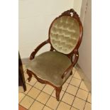 A VICTORIAN WALNUT BUTTONED SPOON BACK ARMCHAIR