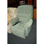 A GREEN UPHOLSTERED ELECTRIC RECLINING ARMCHAIR
