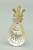 A SILVER CADDY SPOON with shell designed bowl and the Prince of Wales feathers to the handle, with