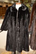 A LONG DARK RANCH MINK FUR COAT