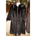 A LONG DARK RANCH MINK FUR COAT