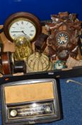 VARIOUS CLOCKS, A BUSH BAKELITE RADIO etc, to include Black Forest cuckoo clock, with weights (