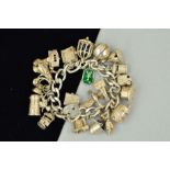 A SILVER CHARM BRACELET AND CHARMS, the curb link bracelet suspending 21 charms, to include a hinged
