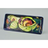 A MOORCROFT POTTERY RECTANGULAR PIN TRAY, Fig and Fruit pattern, impressed and painted backstamp,