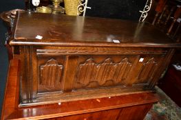 AN OAK LINENFOLD BLANKET CHEST