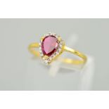 A MODERN SYNTHETIC RUBY AND CUBIC ZIRCONIA PEAR SHAPE CLUSTER RING, ring size K1/2, stamped '916',