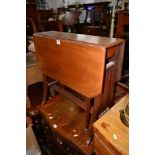 AN EDWARDIAN MAHOGANY SUTHERLAND TABLE