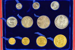 A CASED SET OF VICTORIA JUBILEE COINS, 1887, gold five pounds to silver threepence, to include