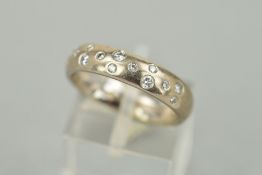 A MODERN 18CT WHITE GOLD DIAMOND SET BAND RING, diamonds 'scatter' rub over set estimated total