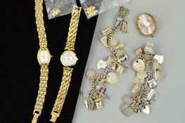 TWO CHARM BRACELETS, TWO WATCHES AND A BROOCH to include two curb link charm bracelets suspending
