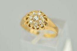 A MID VICTORIAN 18CT GOLD DIAMOND RING, the central old cut diamond within a single cut diamond