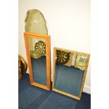 A GILT FRAMED BEVELLED EDGE WALL MIRROR, a pine wall mirror and another mirror (3)