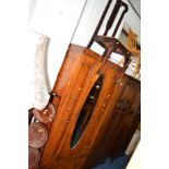 AN OAK SINGLE MIRROR DOOR WARDROBE above a single drawer, a pair of Edwardian dining chairs and a